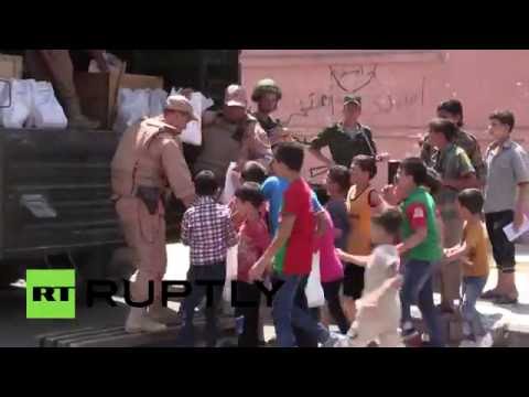 بالفيديو وصول مساعدات روسية للسوريين