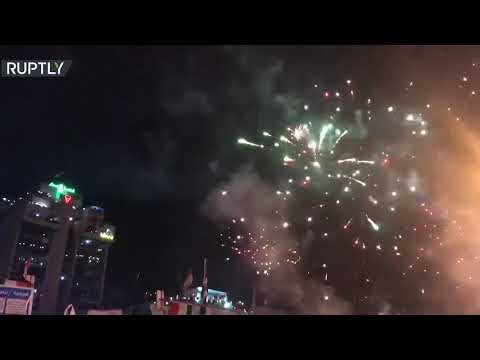 شاهد عراقيون يستقبلون العام الجديد في ساحة التحرير